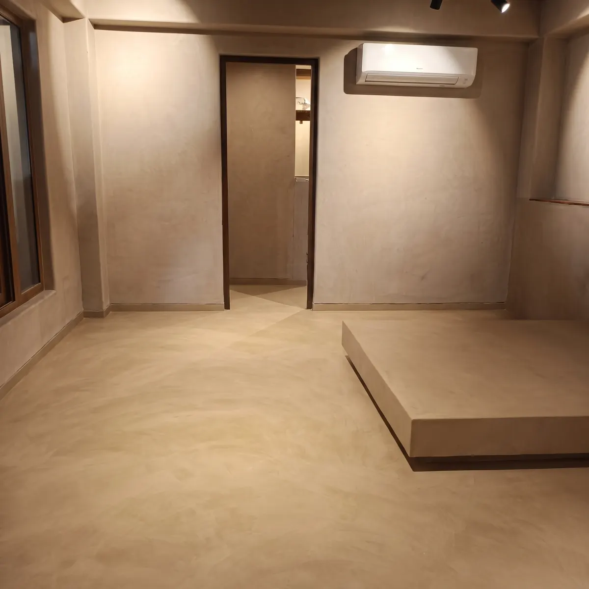 Seamless beige flooring and walls